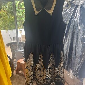 Black Dress with Gold Embroidery and Collar